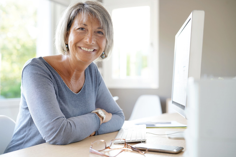 Businesswoman Working on Desktop